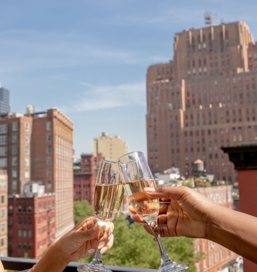 toasting champagne with view of Tribeca
