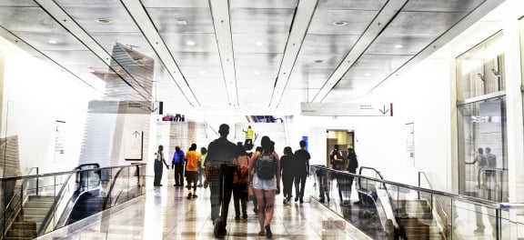 people walking inside of world trade centre oculus