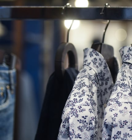 Clothing on racks in a New York store.