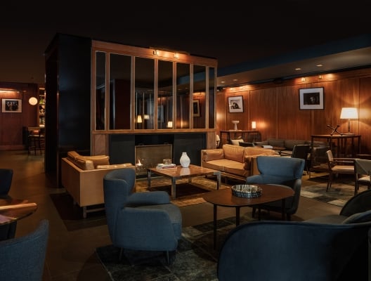 Smyth's Galerie Bar lounge with blue chairs