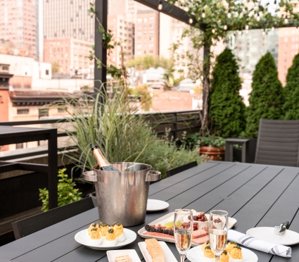 food and beverage spread on hotel terrace