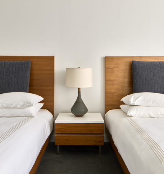 hotel room in New York with two double beds