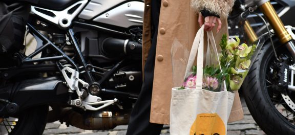 Girl walking in NYC after attending to Tribeca's Farmers Market
