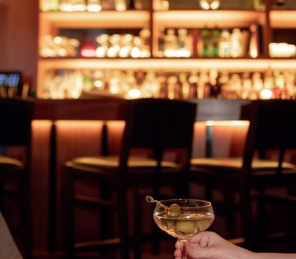 Galerie Bar Tribeca Hotel martini; couple enjoying a martini at Galerie Bar NYC