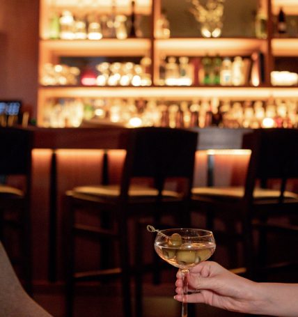 Galerie Bar Tribeca Hotel martini; couple enjoying a martini at Galerie Bar NYC