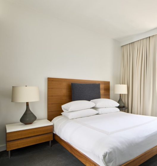 Hotel room in New York with queen bed and private terrace