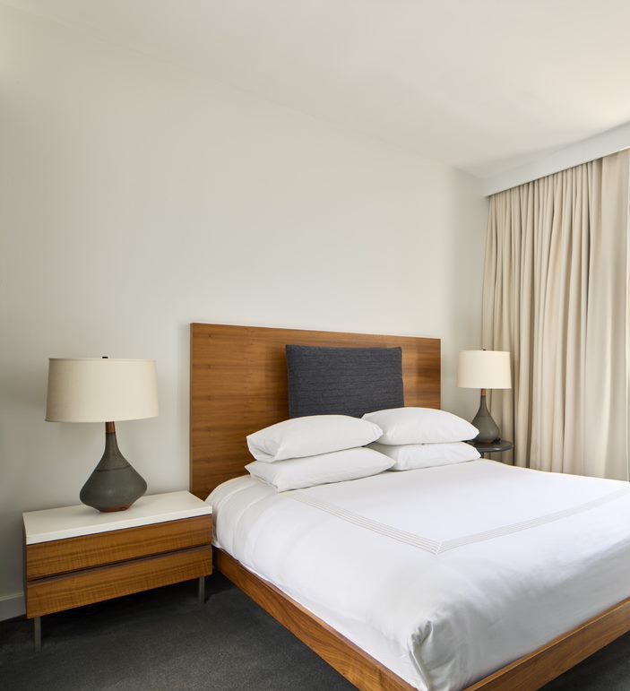 Hotel room in New York with queen bed and private terrace