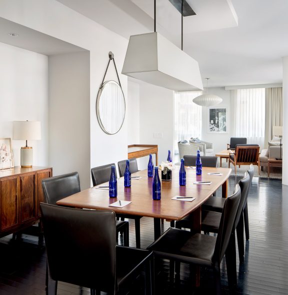 Smyth Hotel NY penthouse dining table set up for board meeting