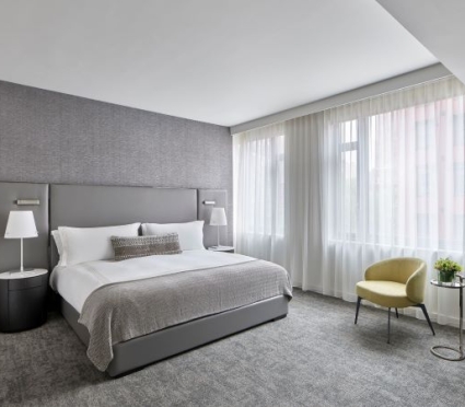 Smyth's Tribeca hotel room with king bed and window