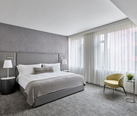 Smyth's Tribeca hotel room with king bed and window